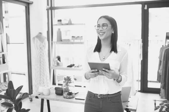 The assistant manager of a boutique shop, taking inventory.