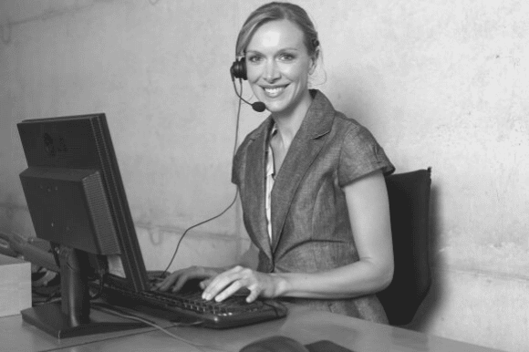 Woman court reporter transcribing at her computer