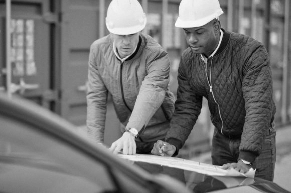 Construction workers viewing plans on a jobsite