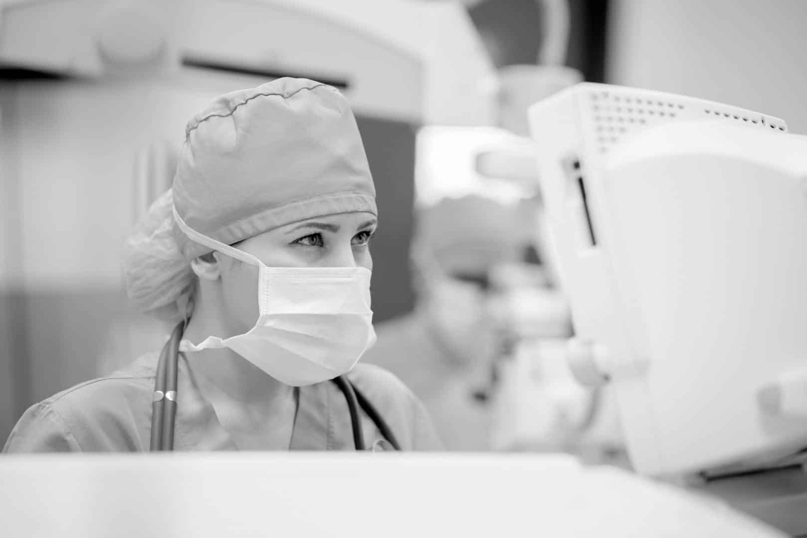 Ventilator monitor and african american female patient in hospital