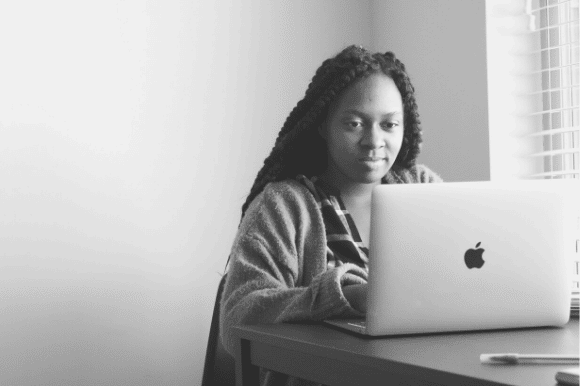 Copywriter working on a draft in front of her computer.