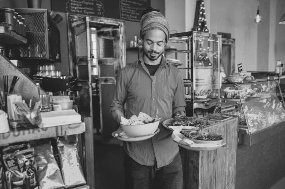 A server works in a restaurant.