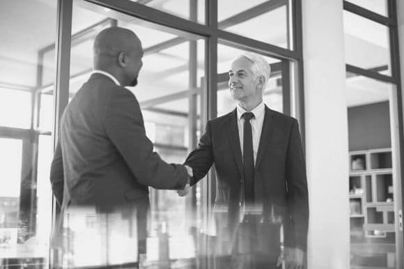 Manager welcoming an unretired worker to the team.