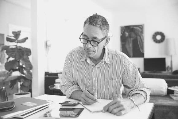 Bookkeeper working at his desk.