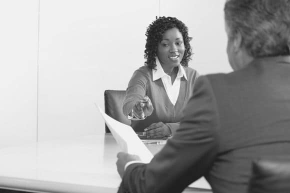 A professional recruiter recommends a candidate to one of her clients.