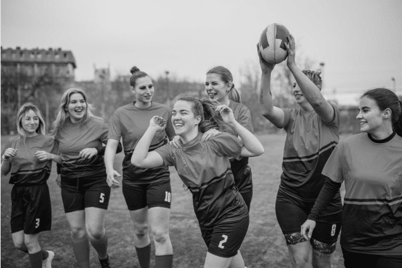 Rugby players celebrate teamwork