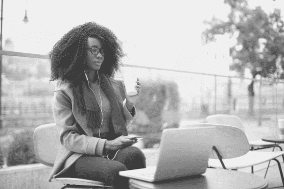 Social media marketing professional working on a campaign using her laptop.