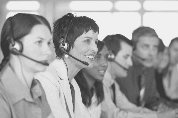 Translator with headset working with other translators.